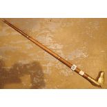 Walking stick with brass horse head handle