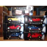 Seven boxed Shell diecast cars