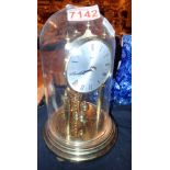 Kundo mechanical anniversary clock in glass dome