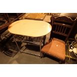 Kitchen table on chrome legs and a carved hall chair with upholstered seat