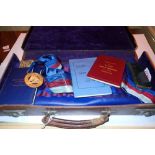 Masonic leather case containing apron collar sash and various books