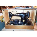 Cased electric Singer sewing machine serial no EH853193 CONDITION REPORT: All