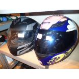 Two motorcycle crash helmets