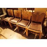 Four mirrorback dining chairs with upholstered seats