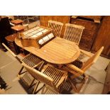 Teak garden table with five steamer style chairs