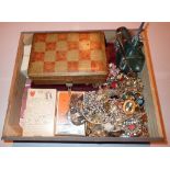 Box of vintage playing cards and jewellery