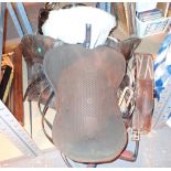 Full leather horse saddle with girth strap,