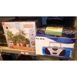 Mixed items including an Oasis plant watering system, CD player, picnic box,