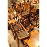 Extending oak dining table with six ladder back chairs 115 x 70 cm