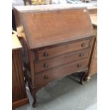 Mahogany drop front bureau with three drawers W: 75 cm