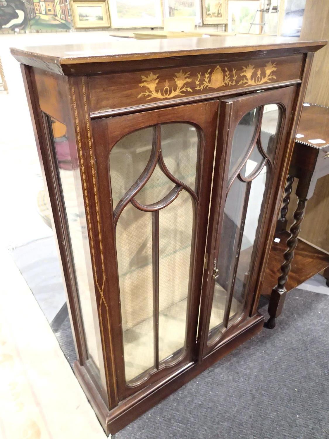 Glass fronted cabinet with inlaid decoration W: 63 cm