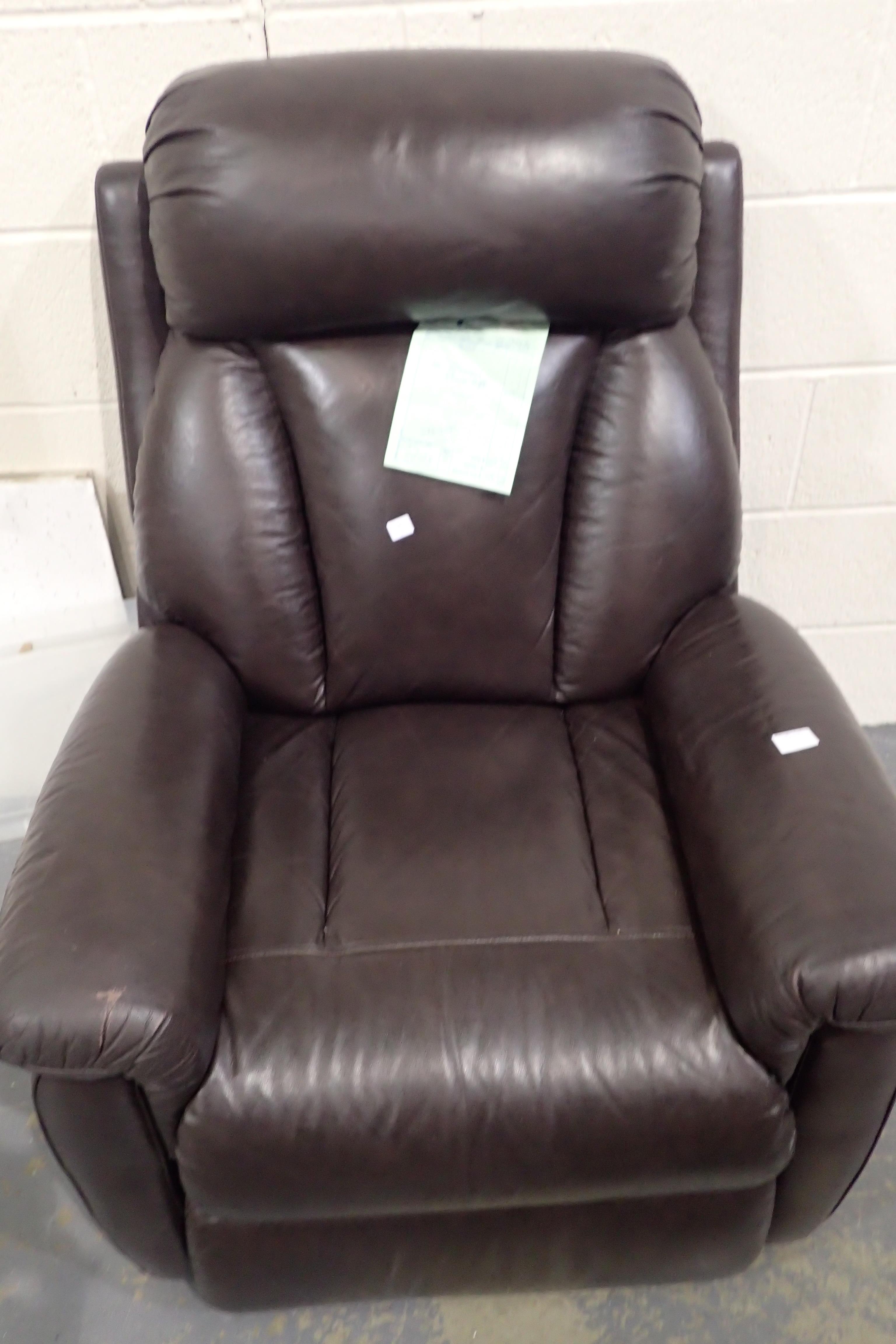 Leather electric riser recliner armchair in good condition with original invoice for £1150