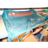 Green fabric suit carrier