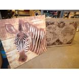 Two paintings, a zebra on canvas and the world on hessian