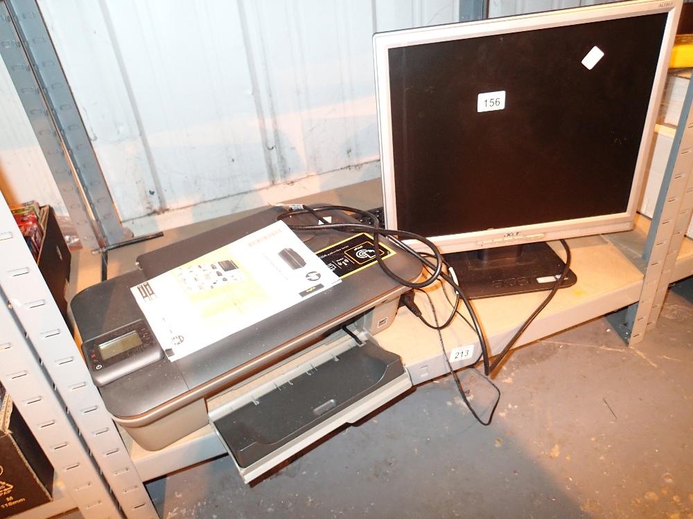 HP printer and an Acer PC monitor and keyboard