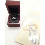 18ct white gold 0.50ct baguette diamond ring size M, with paperwork from Chisholm Hunter, RRP £