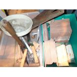 Collection of tools and white ceramic tiles