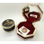 Yellow jewellery box and musical powder compact