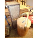 Boxwood cylinder shaped laundry container with wicker cupboard, upper and lower drawer and a