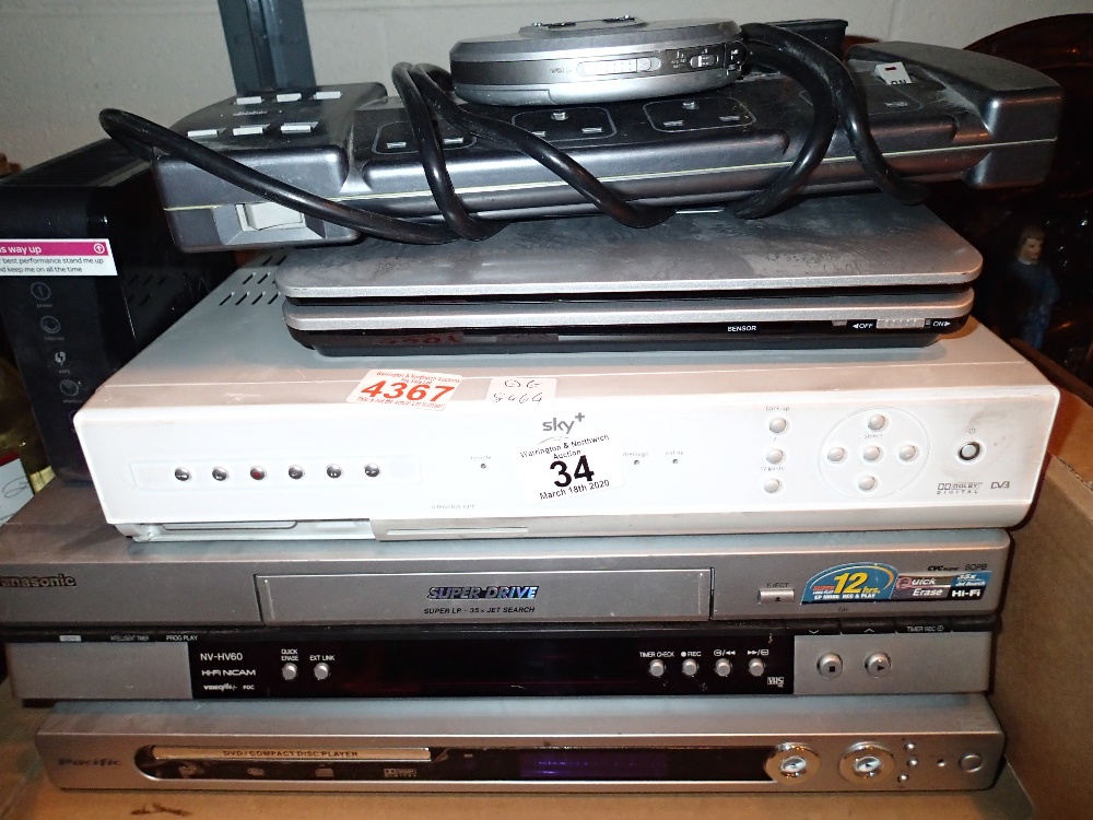 Shelf of mixed electricals to include video players and DVD players