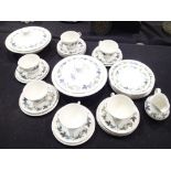 Large collection of Royal Doulton tea and dinnerware in the Burgundy pattern