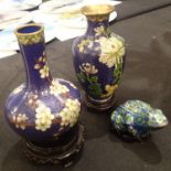 Three pieces of cloisonne ware to include two vases on stands and a frog