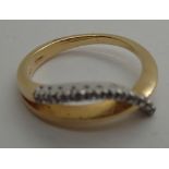18ct yellow gold crossover diamond set ring size P 4.5g
