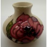 Moorcroft small squat bulbous vase in the Magnolia pattern H: 10 cm