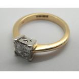 An 18ct gold and diamond engagement ring of 0.5cts. 4g, size L1/2