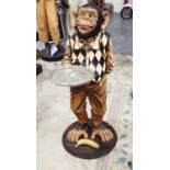 Life sized chimpanzee dumbwaiter with tray and banana H: 100 cm Condition Report: Very light