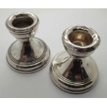 Pair of weighted hallmarked silver dwarf candlesticks