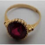 An 18ct gold ruby solitaire ring, 3.4g size M1/2