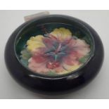 Small Moorcroft lipped bowl in the Blue Hibiscus pattern