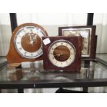 Ediswan electric mantel clock, a Smiths electric mantel clock and another example, all untested