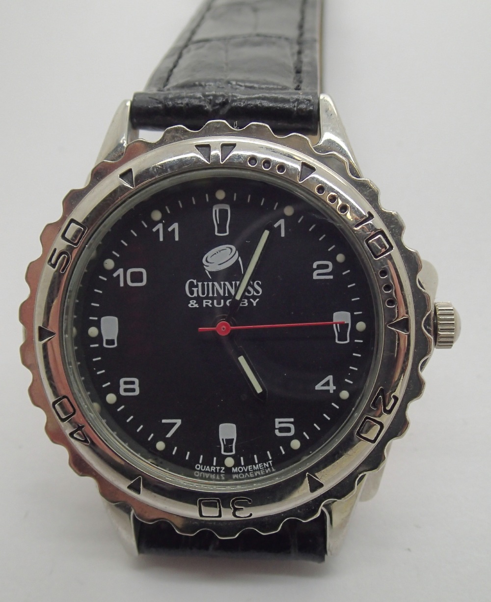 Mens Guinness wristwatch in good condition. Requires new battery.