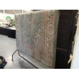 A thick pile Chinese green ground woolen rug 150cm x 250cm