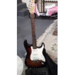 Strat style electric guitar with 15w amplifier and soft carry case