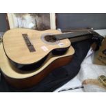Childs Jose Ferrer guitar and an adults Farida acoustic guitar, with soft cases