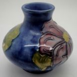 Moorcroft small squat bulbous vase in the Blue Clematis pattern (paper label) H: 10 cm