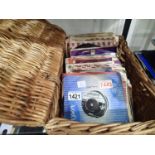 Basket containing approximately sixty 1960-1970s mixed singles
