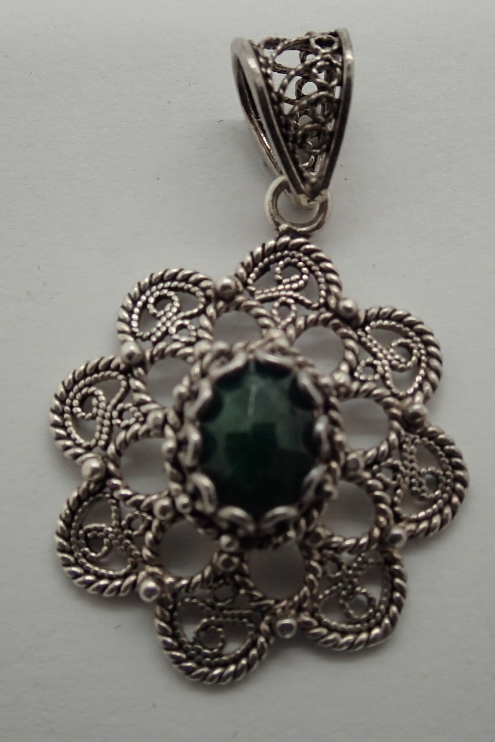 Sterling silver ornate green stone filigree pendant