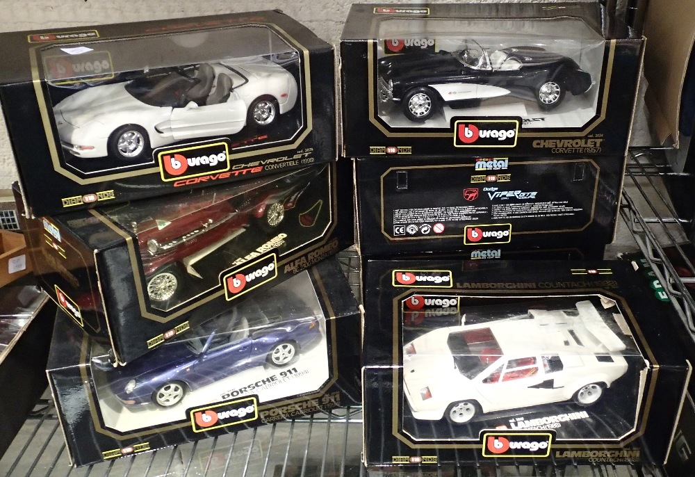 Seven boxed Burago diecast model cars. Boxes in poor condition, vehicles undamaged. P&P to