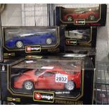 Six boxed Burago diecast model cars. Boxes in poor condition but vehicles undamaged.