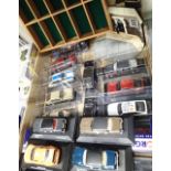 Selection of twenty one diecast cars including Vanguards, ostyl in plastic cases, and a cast diorama