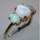 Ladies 9ct gold three stone opal ring size N. P&P group 1 (£16 for the first item and £1.50 for