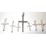 Seven silver crucifixes largest H: 52mm 16.3g total. P&P group 1 (£16 for the first item and £1.50