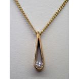 9ct gold pendant set with a single diamond on a 9ct gold chain, chain L: 45 cm. P&P group 1 (£16 for