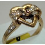 14ct gold fancy heart, ruby and diamond ring size O 4.6g. P&P group 1 (£16 for the first item and £