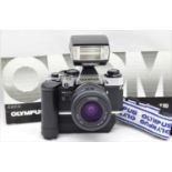 Olympus OM10 with Winder II, with Olympus Zuiko MC Auto-S f1.8 50mm lens, Olympus T20 flash & a