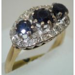 Ladies 18ct gold, fancy sapphire and diamond ring size N 5.2g. P&P group 1 (£16 for the first item